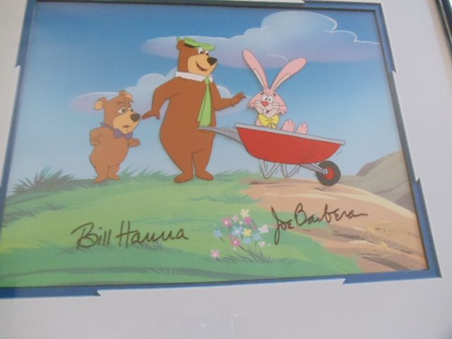 WE PRESENT FOR YOUR CONSIDERATION THIS BEAUTIFUL FRAMED CEL YOGI BEAR 