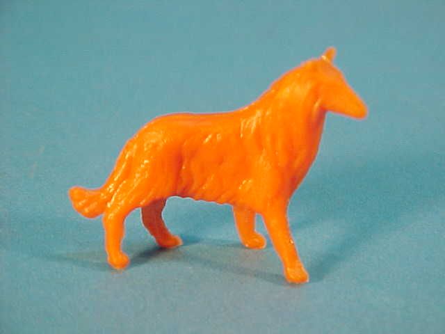 TINY ORANGE COLLIE DOG LASSIE PLASTIC FIGURE 1970s  