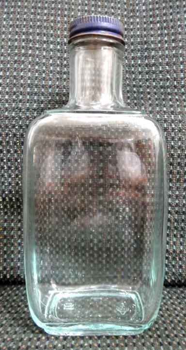 antique REXALL METAL CAP DRUG STORE BOTTLE  