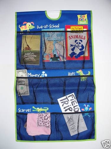 NEW STORAGE ORGANIZER   HANGING POCKETS  ASSORTED STUFF  