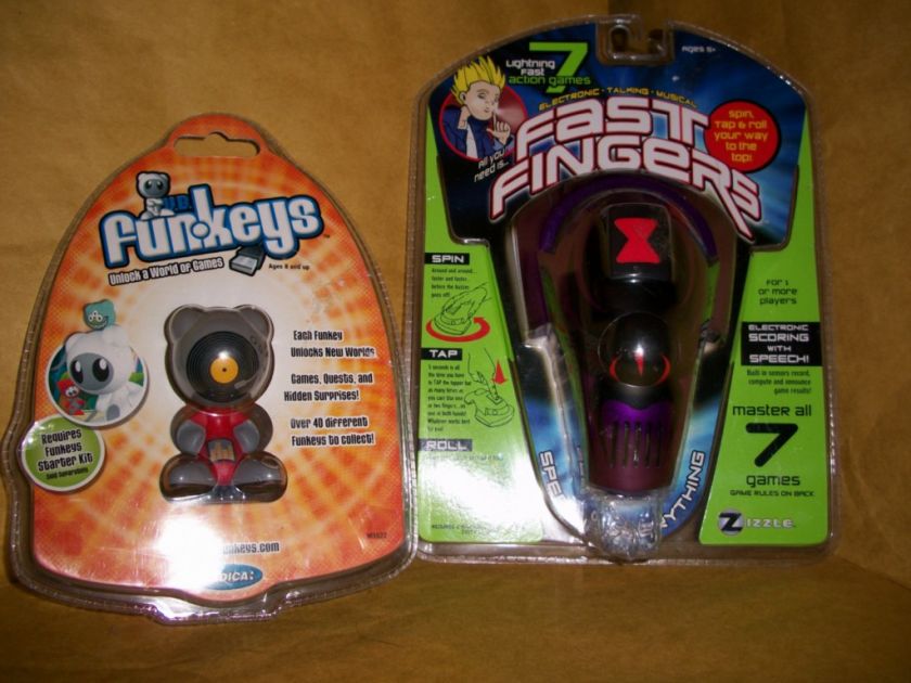 FAST FINGERS 7 GAMES IN 1 & UB FUNKEYS HANDHELD COMPUTER BOTH NEW 